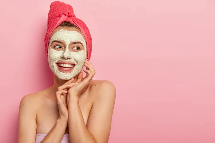 Woman with face pack applied on face | Green tea face pack