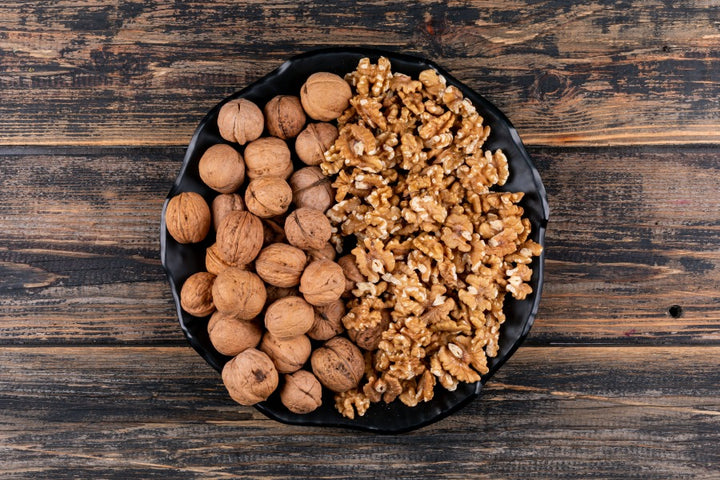 a bowl of walnuts | 8 Science-Backed Health Benefits of Walnuts
