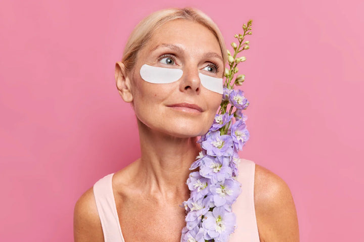 An elderly woman applying under eye mask | how to get rid of under eye wrinkles