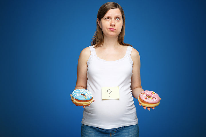 A woman taking in both the hands and seems confused | foods that cause abortion