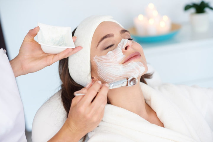 a woman getting dermaplaning treartment | Dermaplaning- Everything You Need to Know