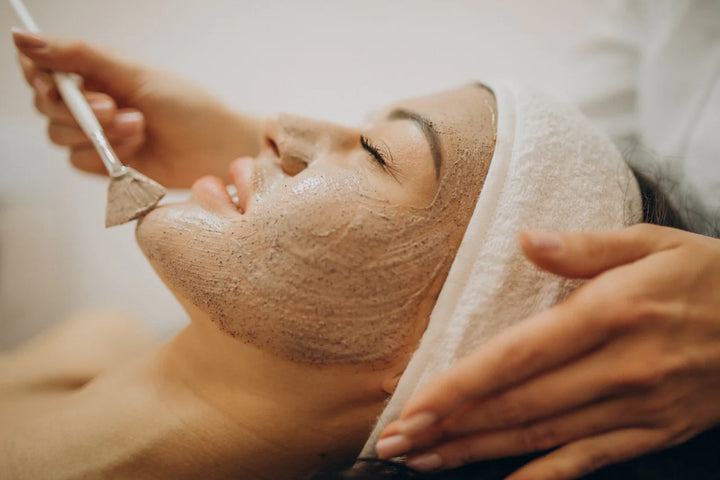 Woman getting applied face mask | Benefits of Multani Mitti for Skin