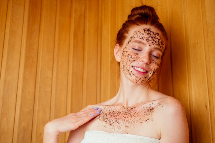 a woman has put coffee sugar scrub on her face | Gharelu Nuskhe Homemade DIY Exfoliating Face Scrubs