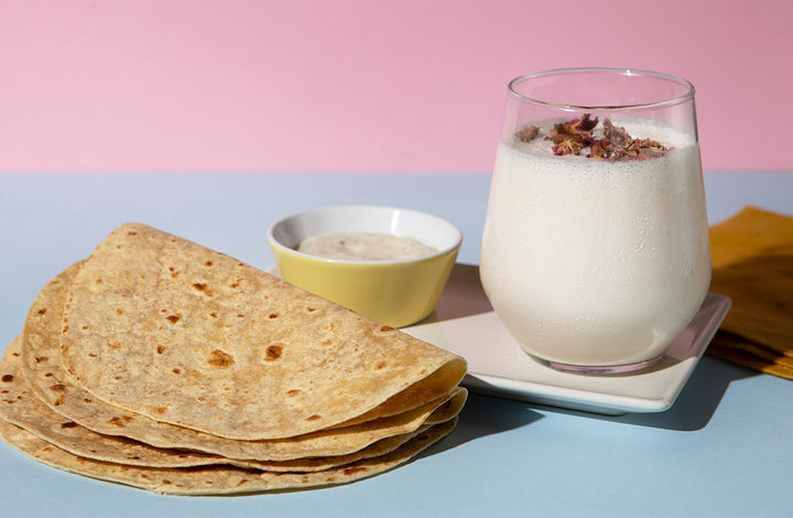 glass of milk bowl of kheer and chapatis | calories in one chapati