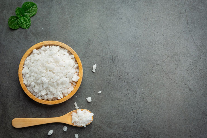 a bowl of sea salt | Various Ways to Use Sea Salt for Clear & Glowing Skin