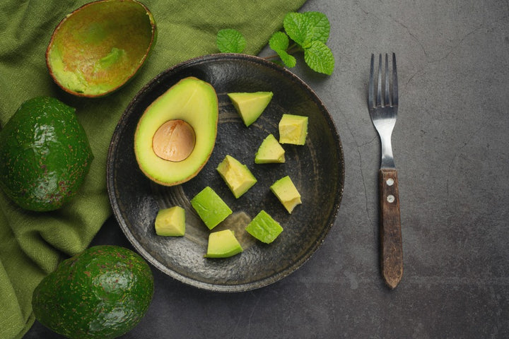 a plate of avocados