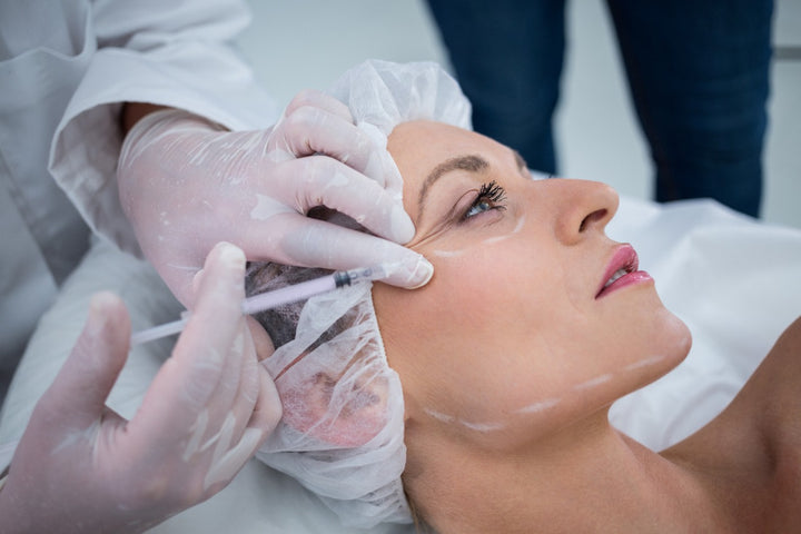 a woman getting face lift treatment